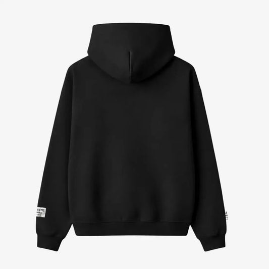 Black oversized zip-up hoodie back view laid flat on a white background. The premium heavyweight cotton fleece CELESTIC Black Outline Hoodie shows a clean, minimalist back with a structured double-lined hood and woven brand patches visible on the sleeves.