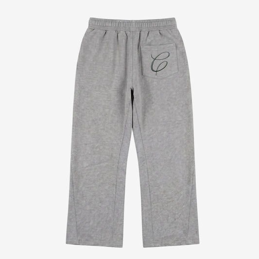Back view flat-lay photograph of the CELESTIC Grey Zipper Flared Pants on a white background. These premium heather grey cotton fleece sweatpants feature a relaxed flared-leg fit and a single right back pocket detailed with an elegant black embroidered 'C' script logo. The image showcases the high-quality stitching and the wide, flared leg silhouette from the rear.
