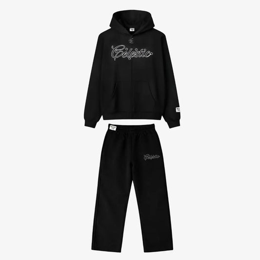 Black oversized tracksuit front view. Premium heavyweight cotton fleece two-piece set featuring a hoodie and matching sweatpants with subtle logo details.
