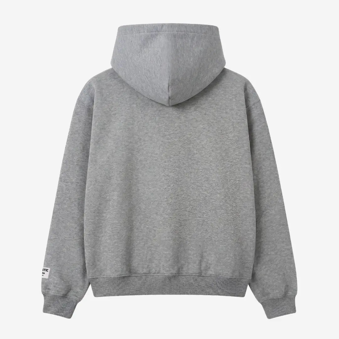 Back view of the CELESTIC Grey Basic zip-up hoodie laid flat on a white background. The premium heavyweight grey cotton fleece is shown with a structured double-lined hood and a clean minimalist back, featuring a woven brand patch on the left sleeve.