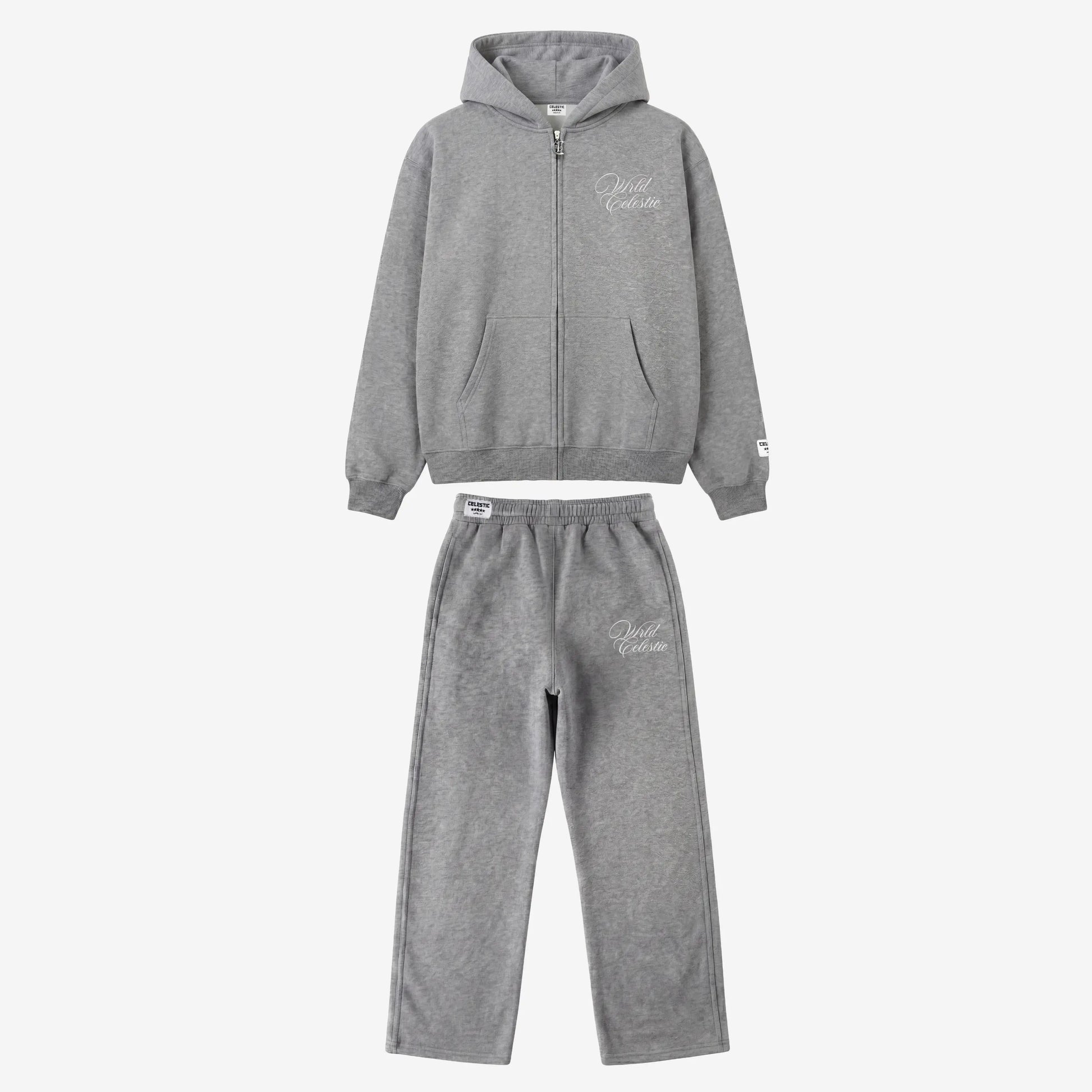 Main product image of the CELESTIC Grey Basic Tracksuit set. This premium heavyweight grey cotton fleece ensemble includes an oversized full-zip hoodie with white script logo embroidery on the chest, a custom metal 'C' zipper pull, and matching relaxed straight-leg sweatpants with thigh embroidery and a branded elastic waistband.