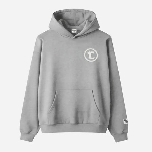Front view flat-lay photograph of the CELESTIC Grey Star Hoodie on a white background. This premium heather grey cotton fleece pullover hoodie features a structured double-lined hood and a classic kangaroo pocket. A white circular 'C' star logo is featured on the left chest, elegantly framed with a border of sparkling rhinestones. A white woven CELESTIC brand patch is visible on the left sleeve cuff.