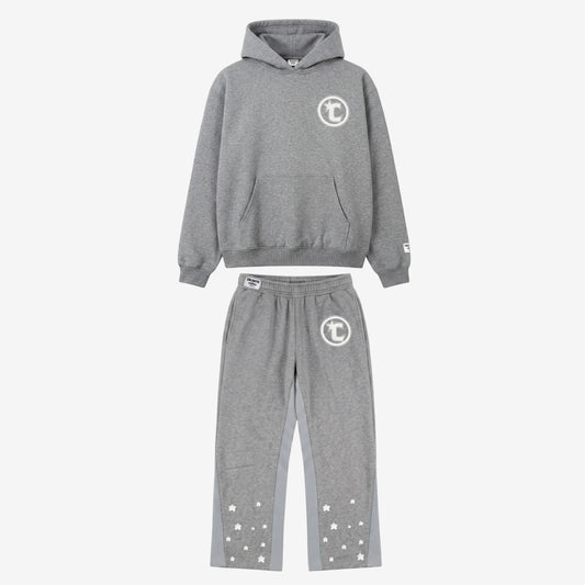 Gray hoodie and pants set with a logo on a white background