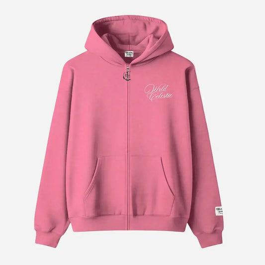 Pink oversized full-zip hoodie front view laid flat on a white background. The premium heavyweight cotton fleece CELESTIC Pink Basic Hoodie features white script logo embroidery on the left chest, a custom metal 'C' zipper pull, front pockets, and a woven brand patch on the left sleeve.