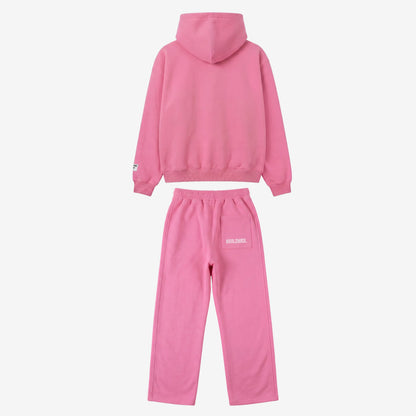 Back view of the Celestic Pink Basic Tracksuit. Premium pink heavyweight oversized hoodie and matching sweatpants set, featuring white WORLDWIDE embroidery on the back pocket of the joggers.