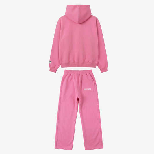 Back view of the Celestic Pink Basic Tracksuit. Premium pink heavyweight oversized hoodie and matching sweatpants set, featuring white WORLDWIDE embroidery on the back pocket of the joggers.
