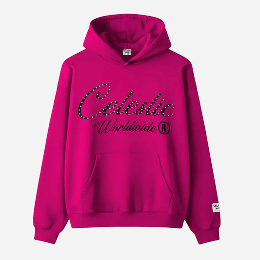 Detailed front flat-lay photograph of a light pink premium heavyweight cotton fleece pullover hoodie on a white background. It features a spacious hood, a kangaroo pocket, and ribbed cuffs and hem. The chest is decorated with a large, shimmering black rhinestone-embellished screen-printed logo. The logo is a circular 'C' with a central five-pointed star. Above the logo, the rhinestone text 'C.S.' is clear. Below the logo, the large rhinestone text 'CELESTIC' and the smaller printed text 'HELSINKI' are clear