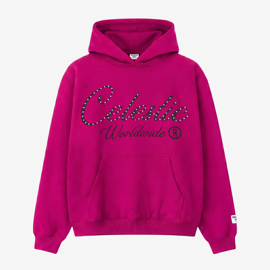 Detailed front flat-lay photograph of a light pink premium heavyweight cotton fleece pullover hoodie on a white background. It features a spacious hood, a kangaroo pocket, and ribbed cuffs and hem. The chest is decorated with a large, shimmering black rhinestone-embellished screen-printed logo. The logo is a circular 'C' with a central five-pointed star. Above the logo, the rhinestone text 'C.S.' is clear. Below the logo, the large rhinestone text 'CELESTIC' and the smaller printed text 'HELSINKI' are clear