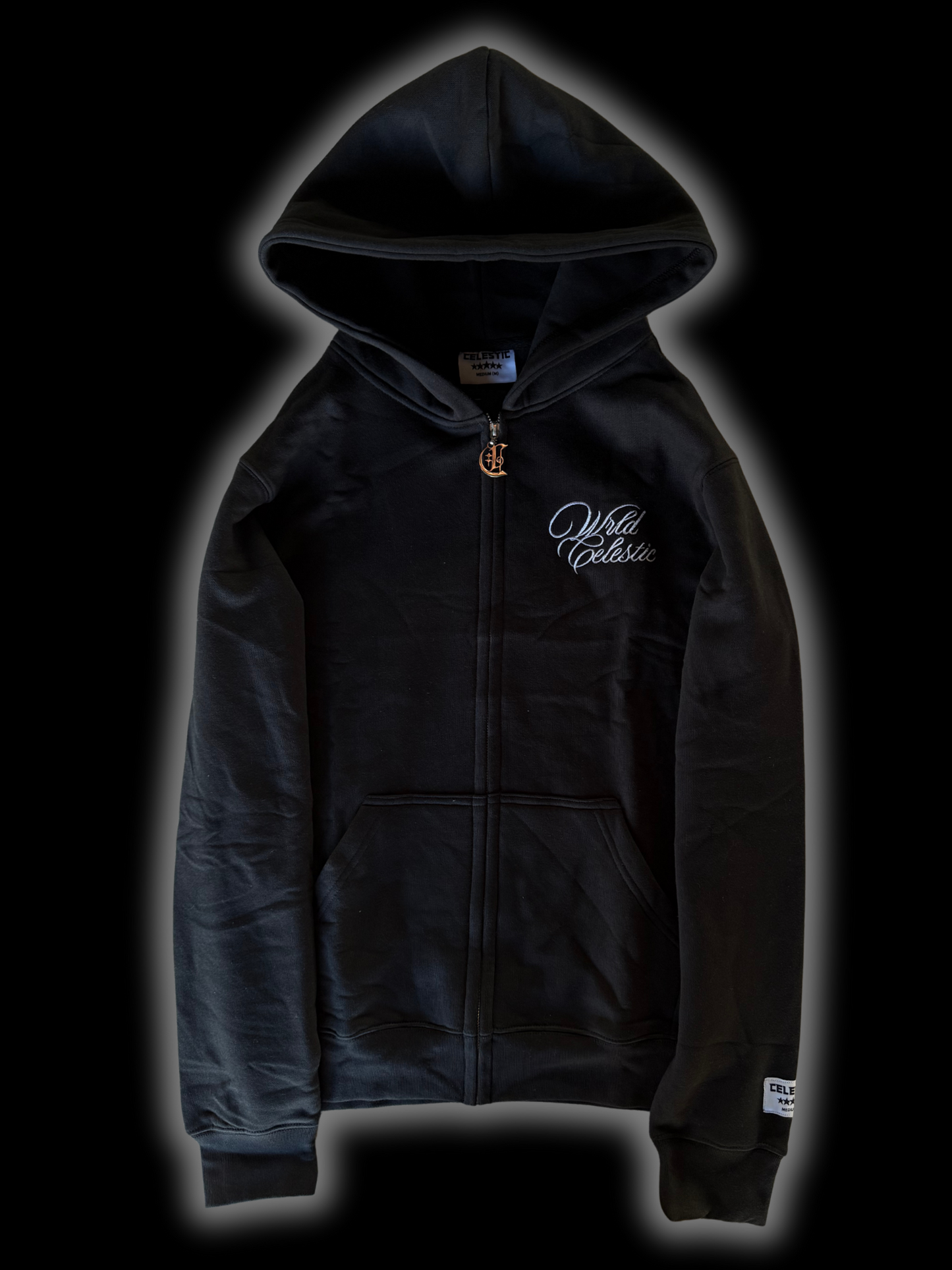 Black hoodie with a brand logo on a black background